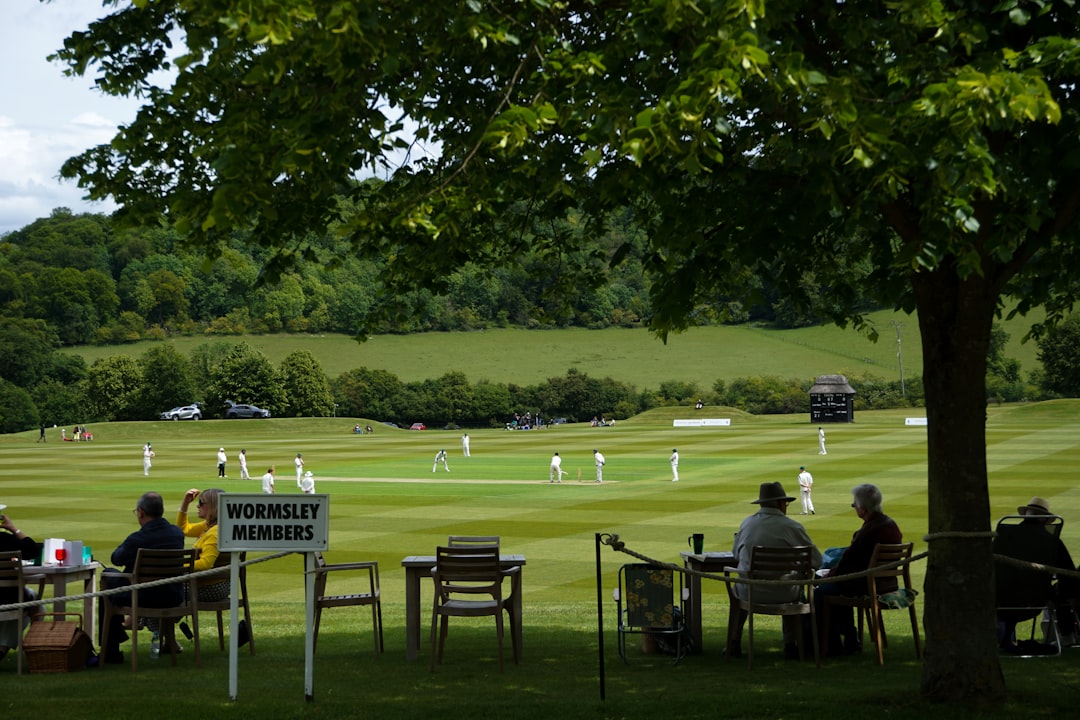 people sitting on chair on green grass field during daytime county sports partnership, funding, sport england, grants