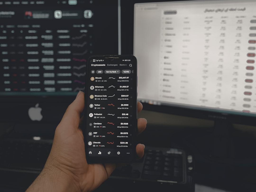 person holding black android smartphone live sports betting, fluctuating odds, sportsbook interface