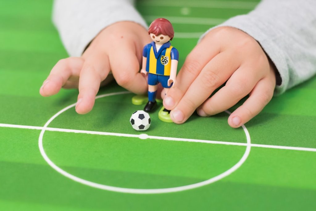person playing minifig soccer animated playbook, digital football tactics, high school coaching
