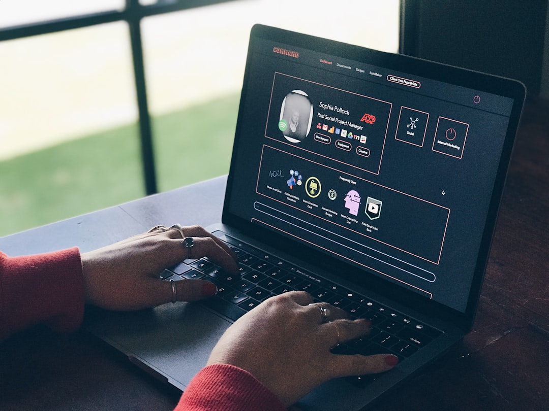 person using laptop computer sports betting professional, sharp bettor, laptop with betting analysis