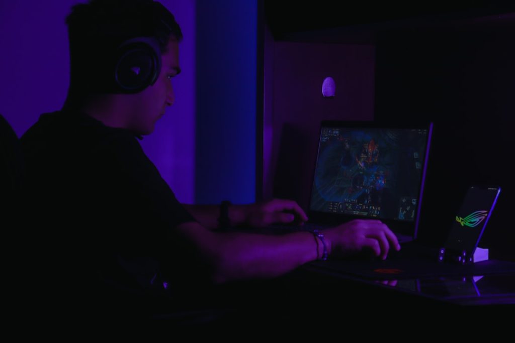 person wearing black and white headphones player highlight video email tech