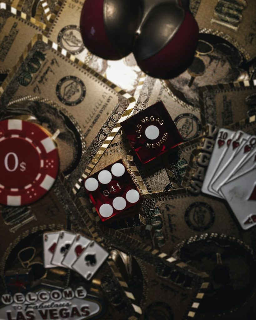 red and gold round ornament responsible gambling, poker chips, casino clock