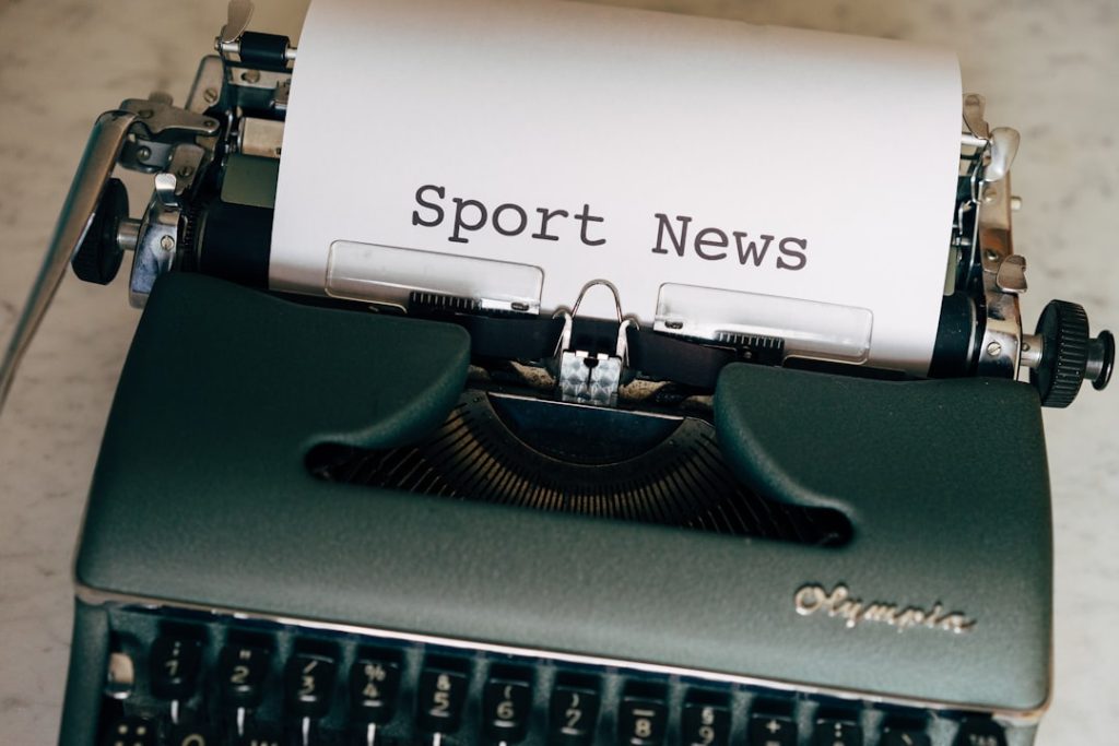 white and black braille typewriter sports injuries, data analytics, headlines