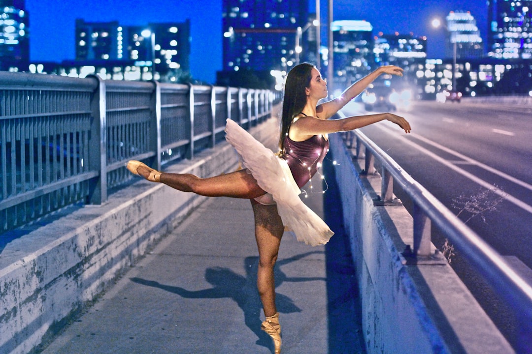 woman wearing ballet dress at roadside dancing ballet dancer, emotional expression, artistic dance