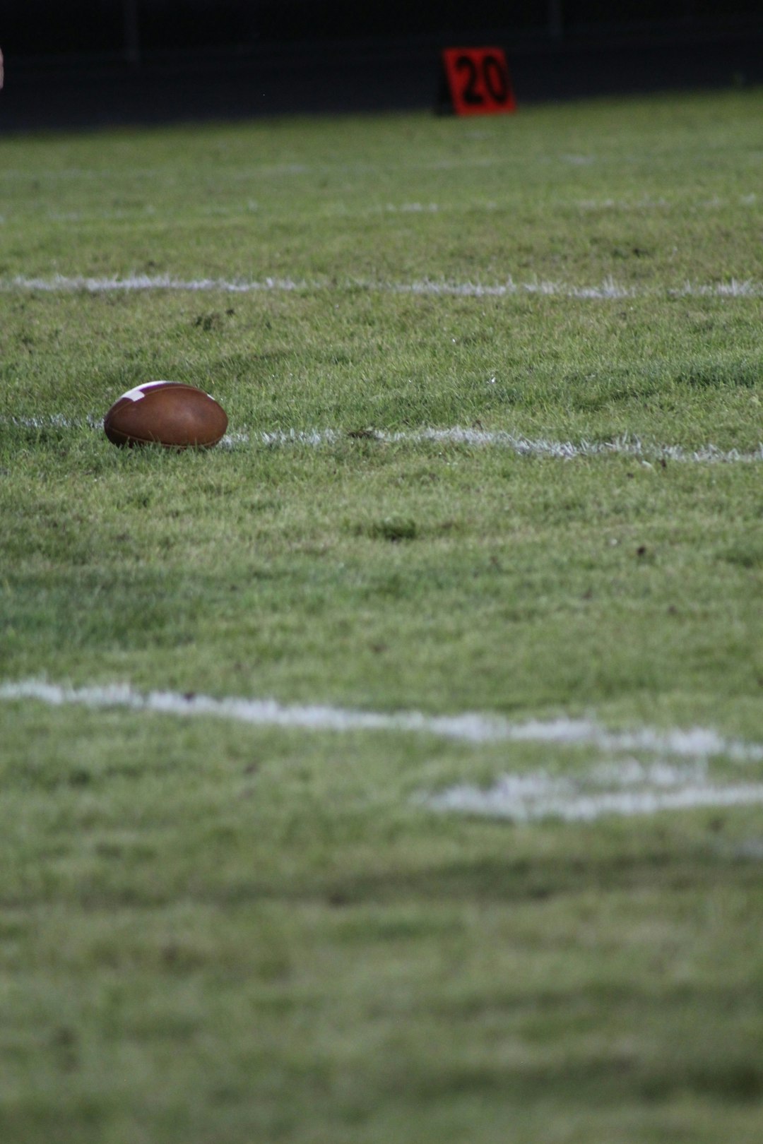 brown football on field cam rising, utah quarterback, football throw