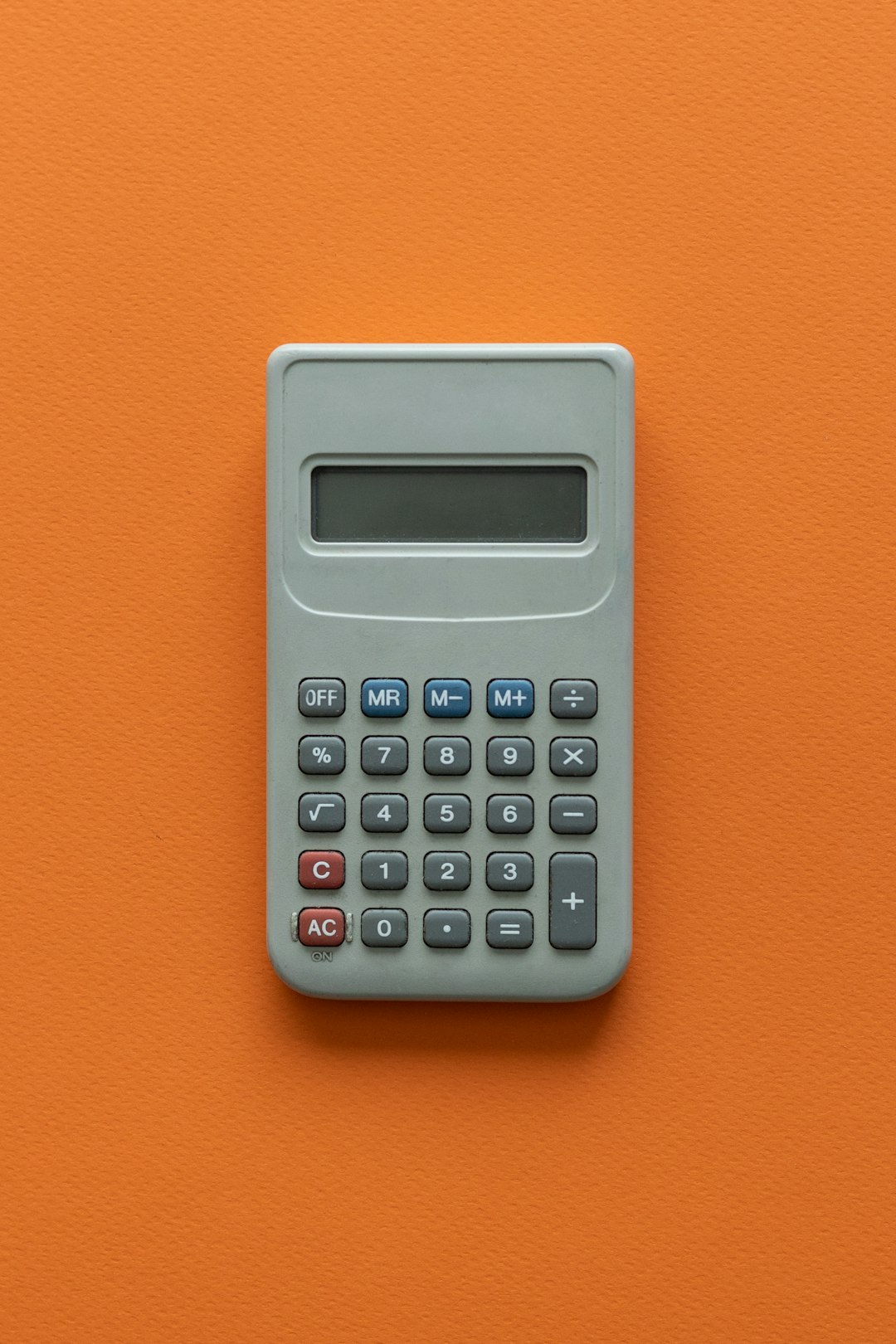 a calculator on a table soccer money contract calculator