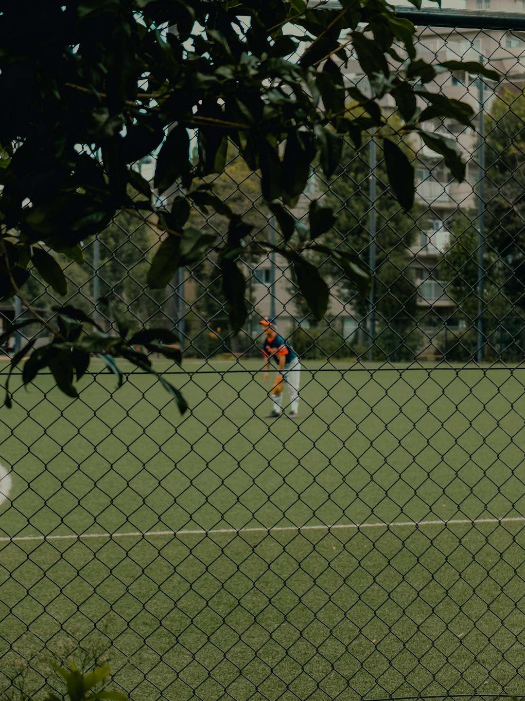 A group of people playing a game of soccer women playing softball, early softball outdoor