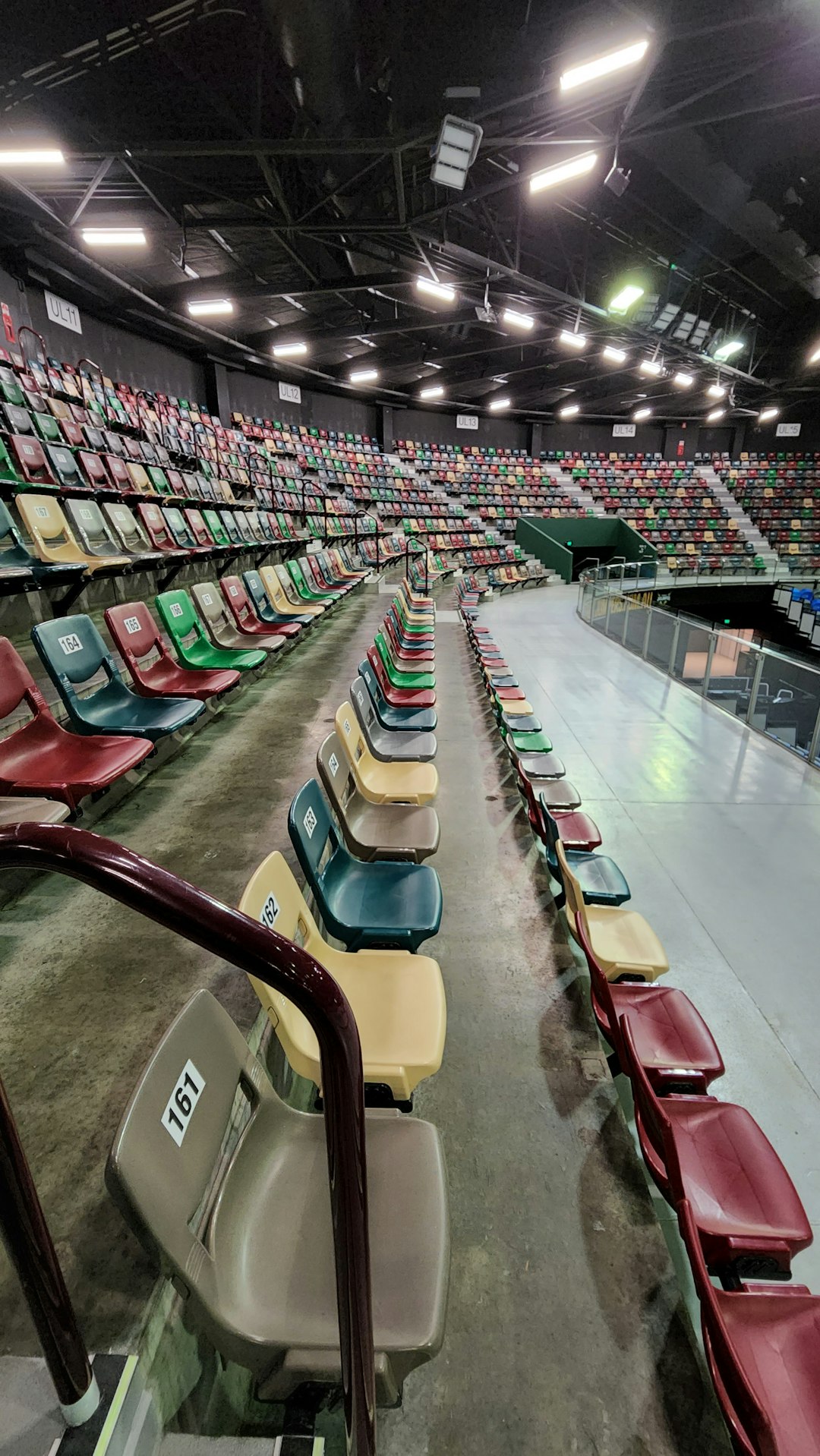 a row of empty seats in a stadium empty seats, struggling hockey team, arena issues