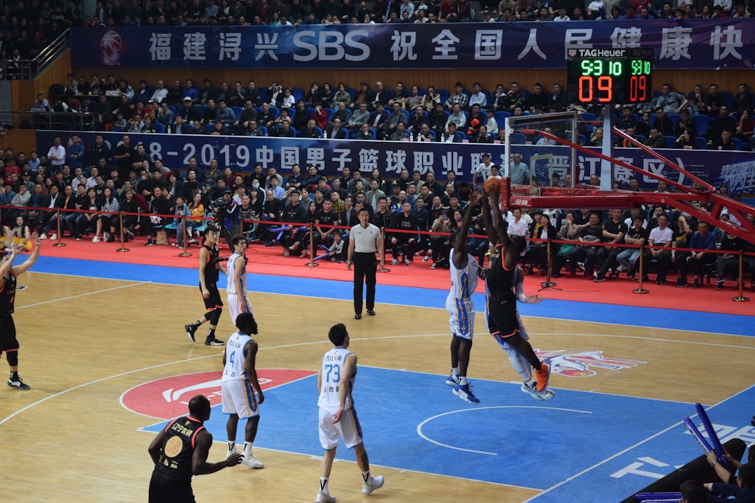 basketball game basketball court fans cheering