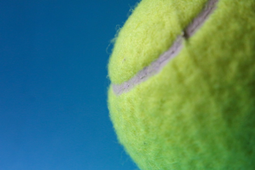 green tennis ball on blue textile atp tour, tennis tournament, tennis ranking, professional tennis