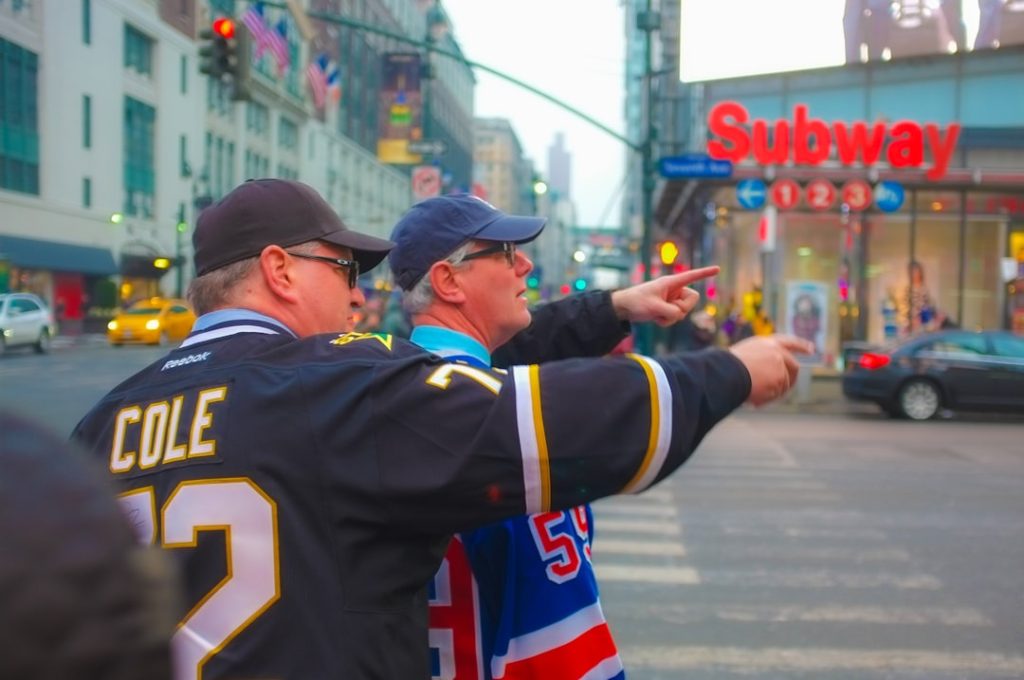people pointing fingers while standing by the road igor shesterkin, new york rangers, nhl goalie save