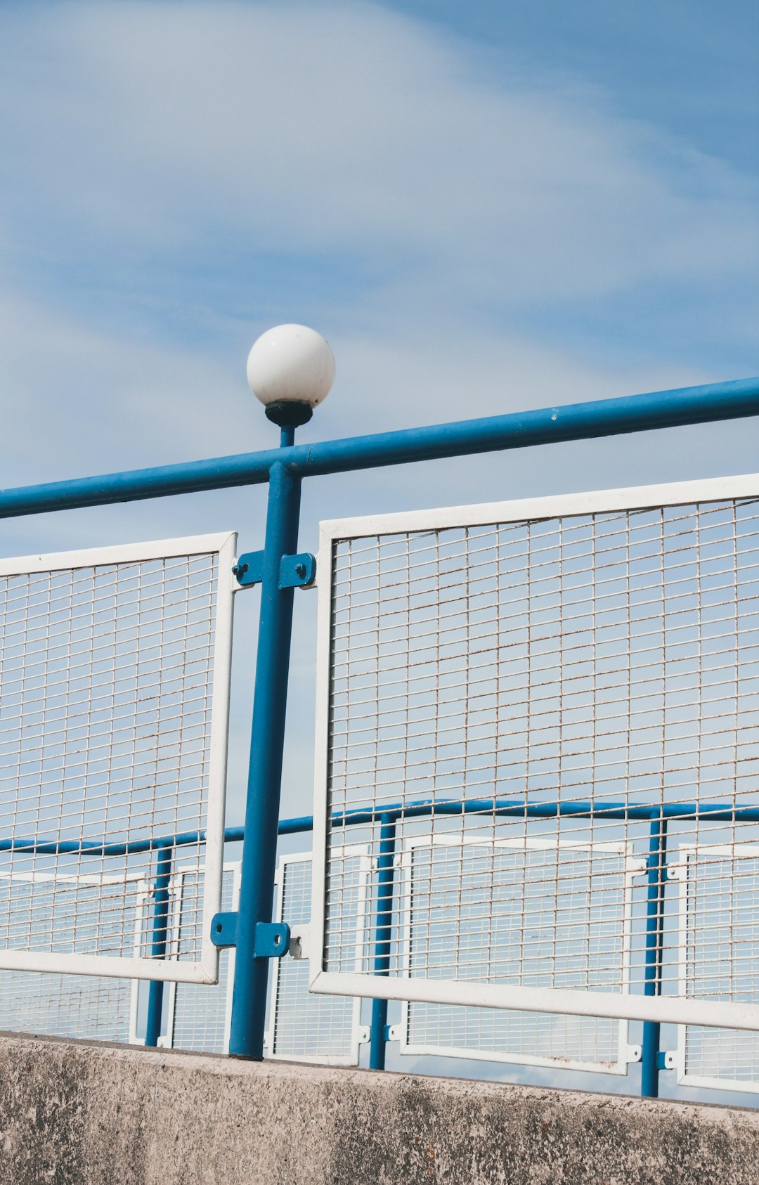 white and blue metal fence volleyball net measurement, accurate net height, volleyball court setup