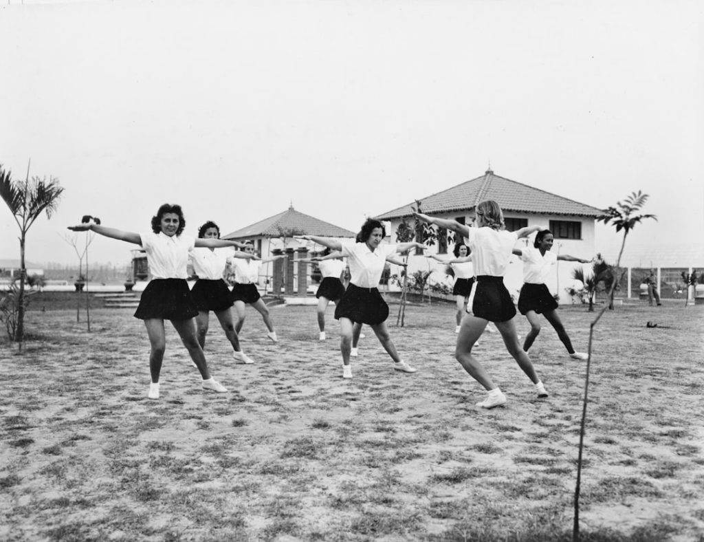 women playing softball, early softball outdoor