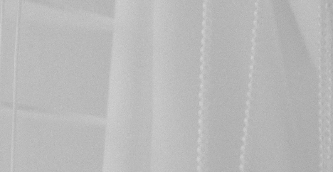 a black and white photo of a white curtain ai in healthcare, ai in finance, industry applications, smart city
