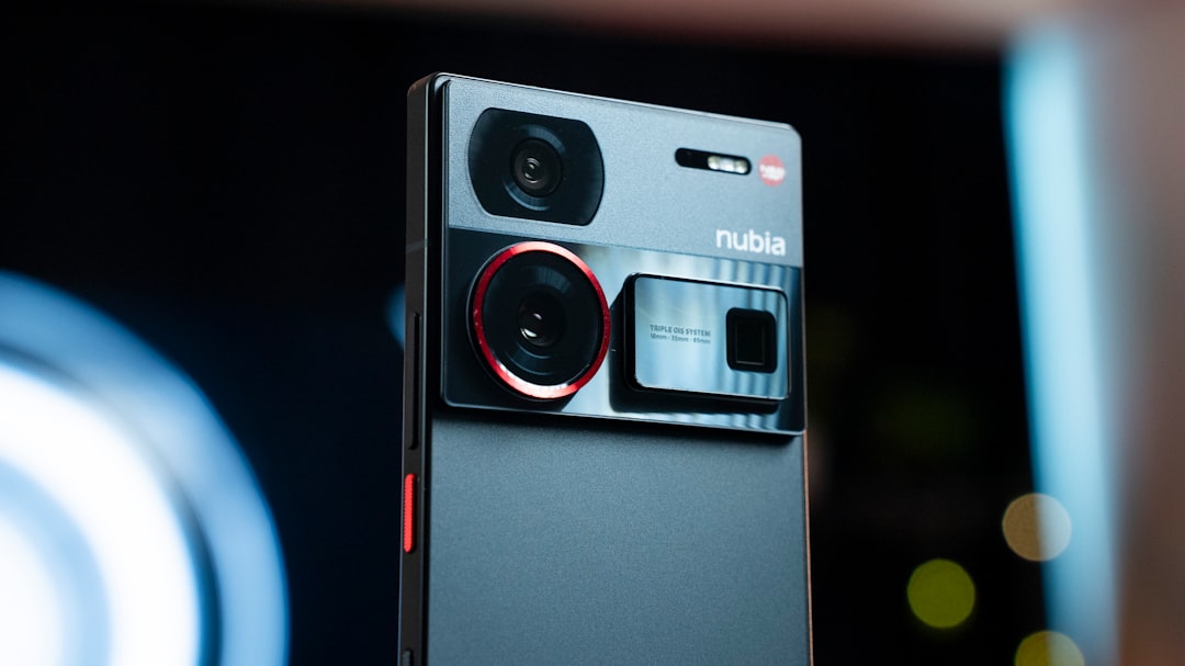 A close up of a cell phone on a table nubia neo2 full view, gaming accessories, budget phone setup