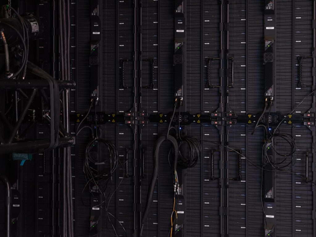 a close up of a server room server deployment, ruby on rails, system admin, cloud hosting
