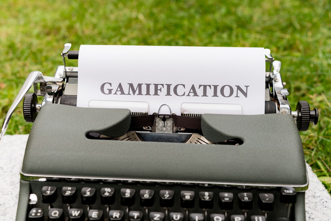 a close up of a typewriter with a paper that reads gamification gaming certificate, audit, slot fair play