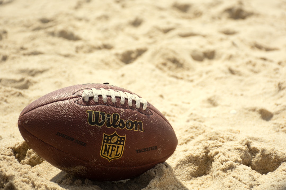 a red ball on sand nfl defense tackle sack browns cowboys