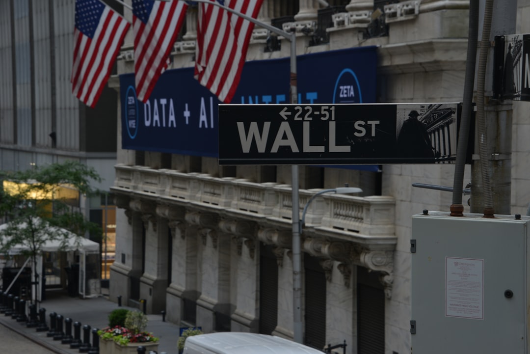 a street sign on wall street in new york city financial crisis, stress, stock market crash