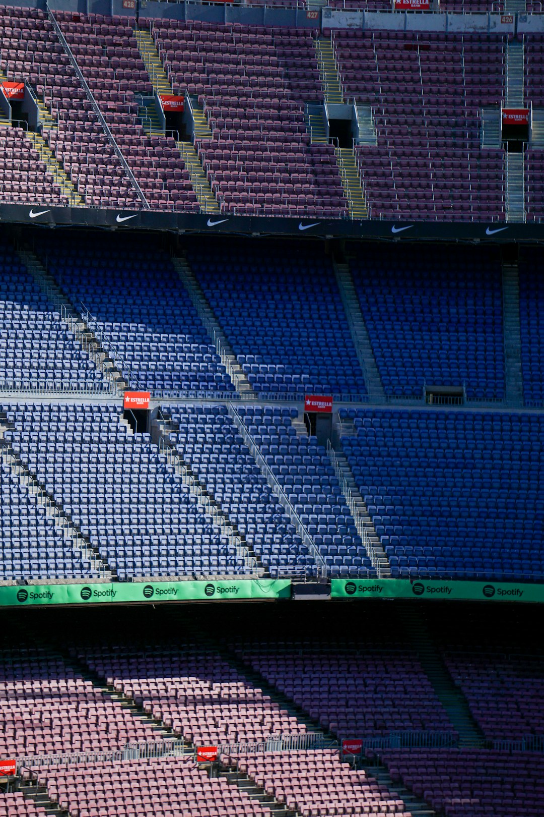 a tennis player on a court with a racket camp nou stadium barcelona atmosphere