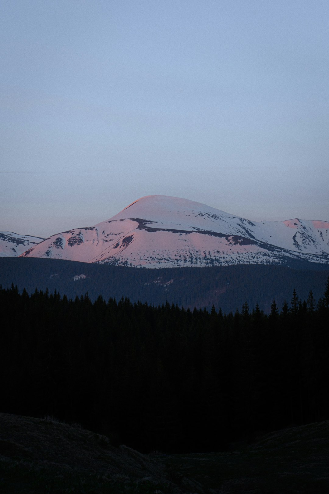 a view of a mountain with trees in the foreground bow hunting sunrise mountain