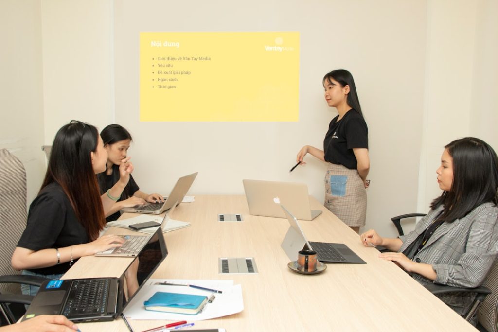 four women inside room e learning platform, digital branding, creative classroom