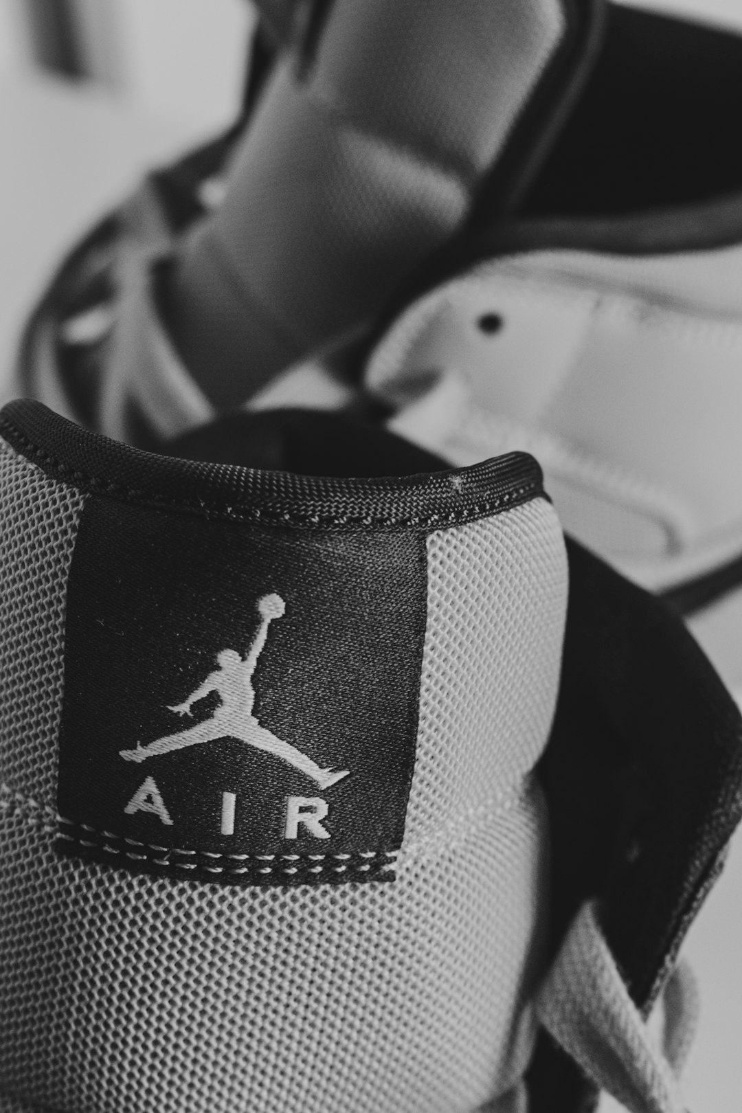 grayscale photo of a nike cap nike air tech challenge 2, hot lava, sneaker retro