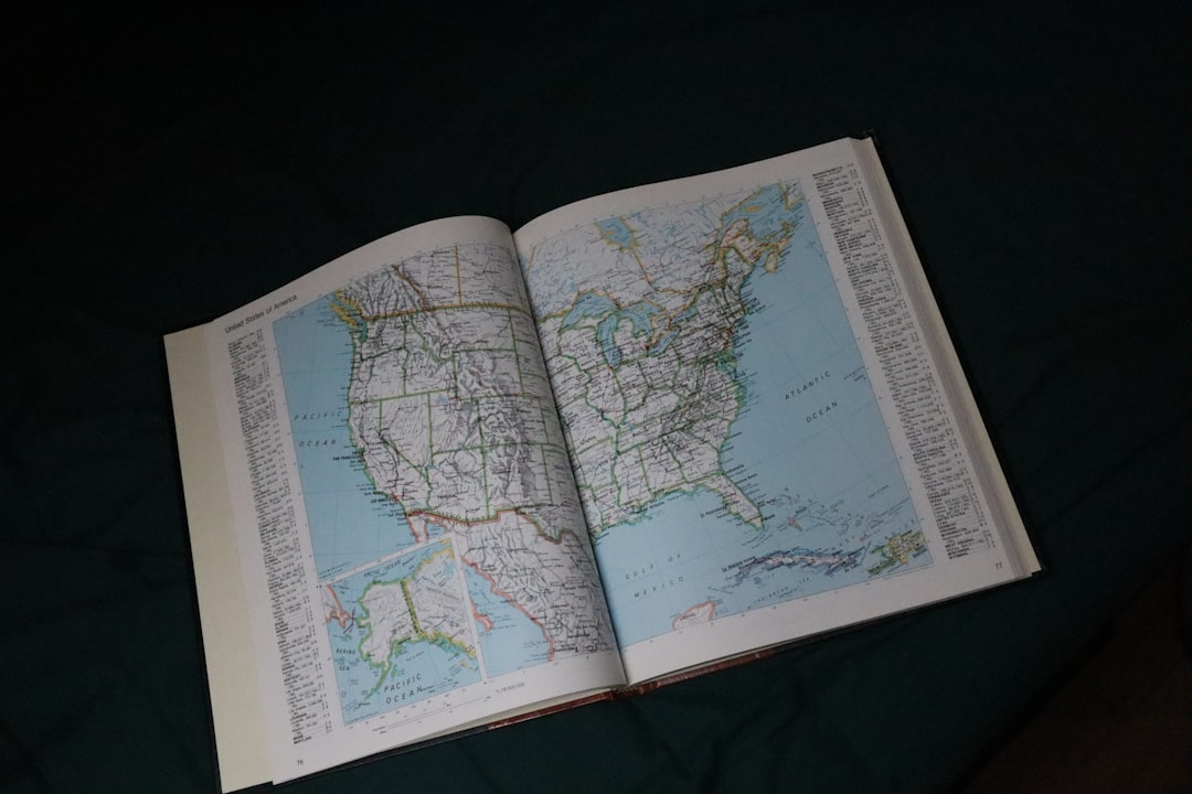 green and white book page usa map, sports betting laws, legalization