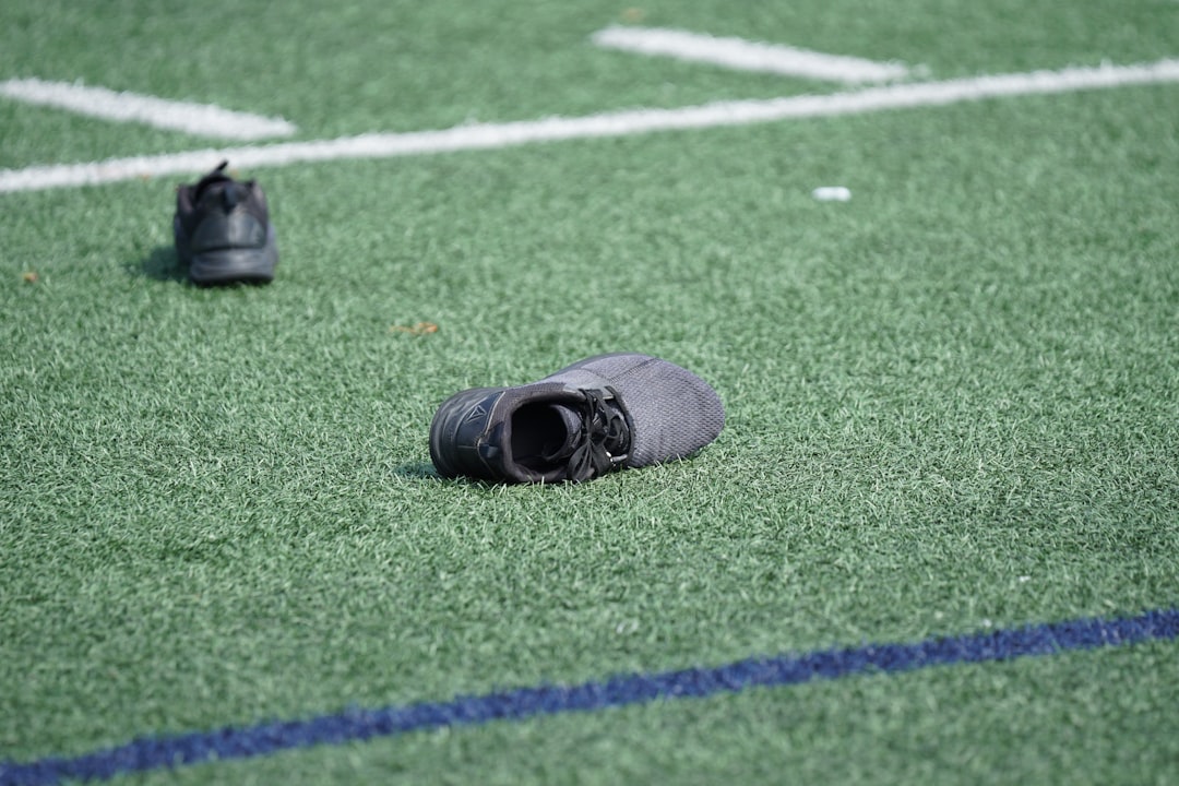 pair of black shoes virtual reality football, coach training, quarterback view