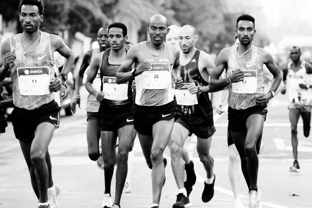 people running ironman race, long distance triathlon, endurance athletes