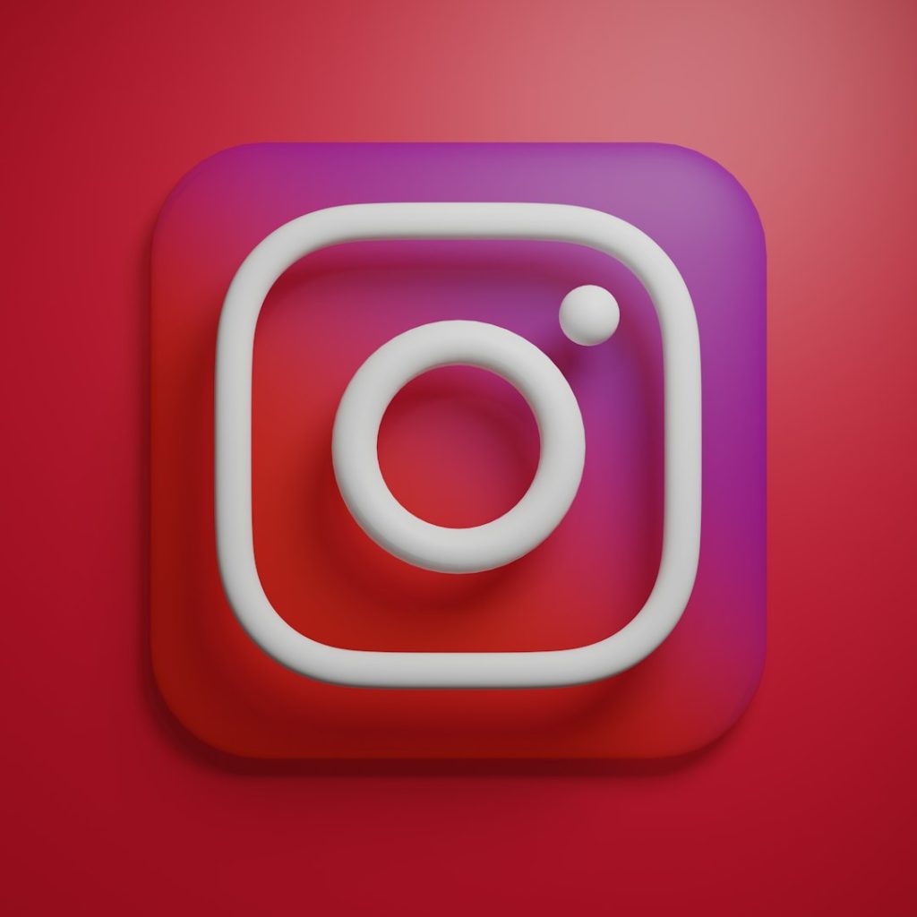 the instagram logo on a red background instagram app phone insights