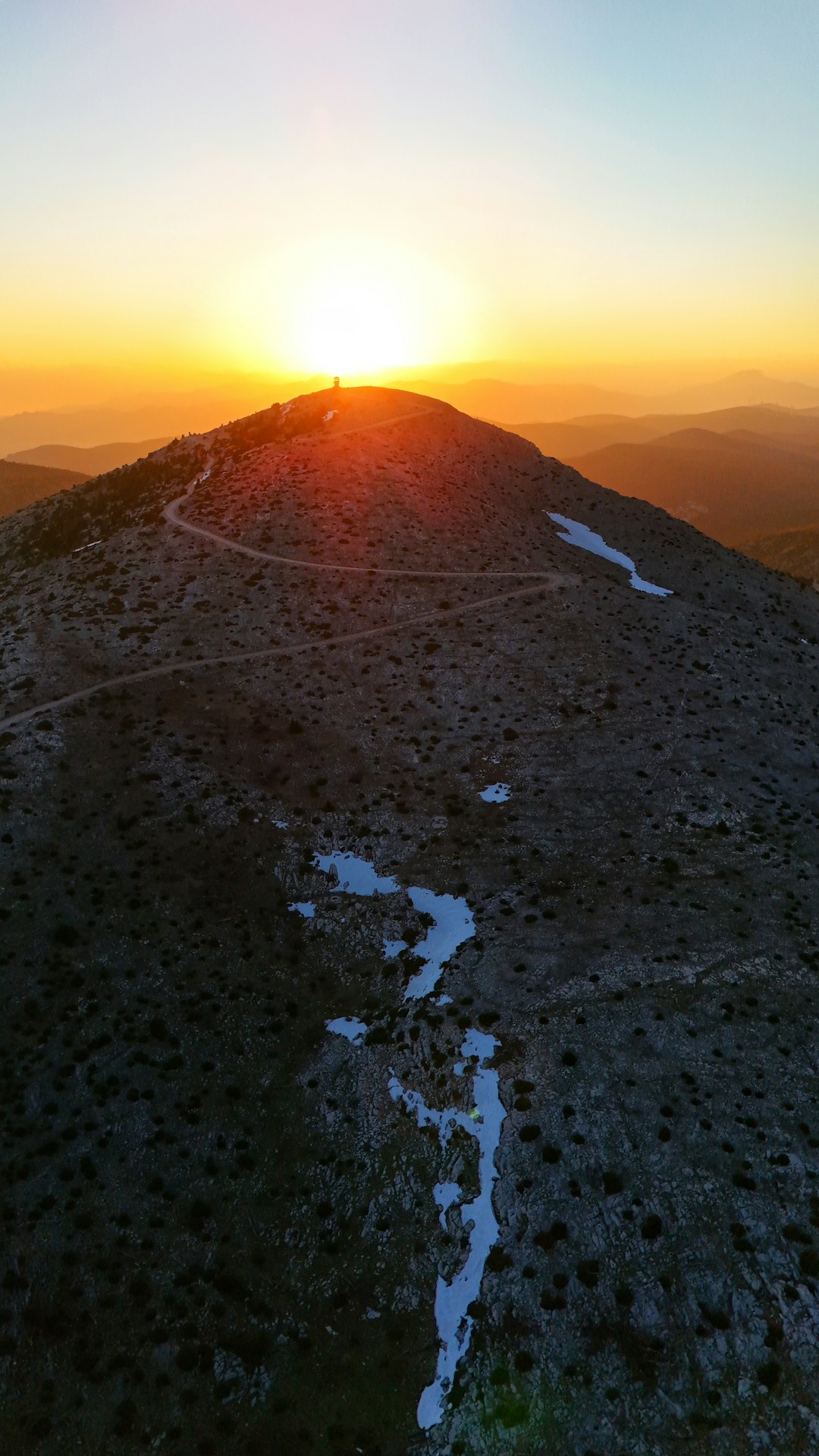 the sun is setting on the top of a mountain bow hunting sunrise mountain