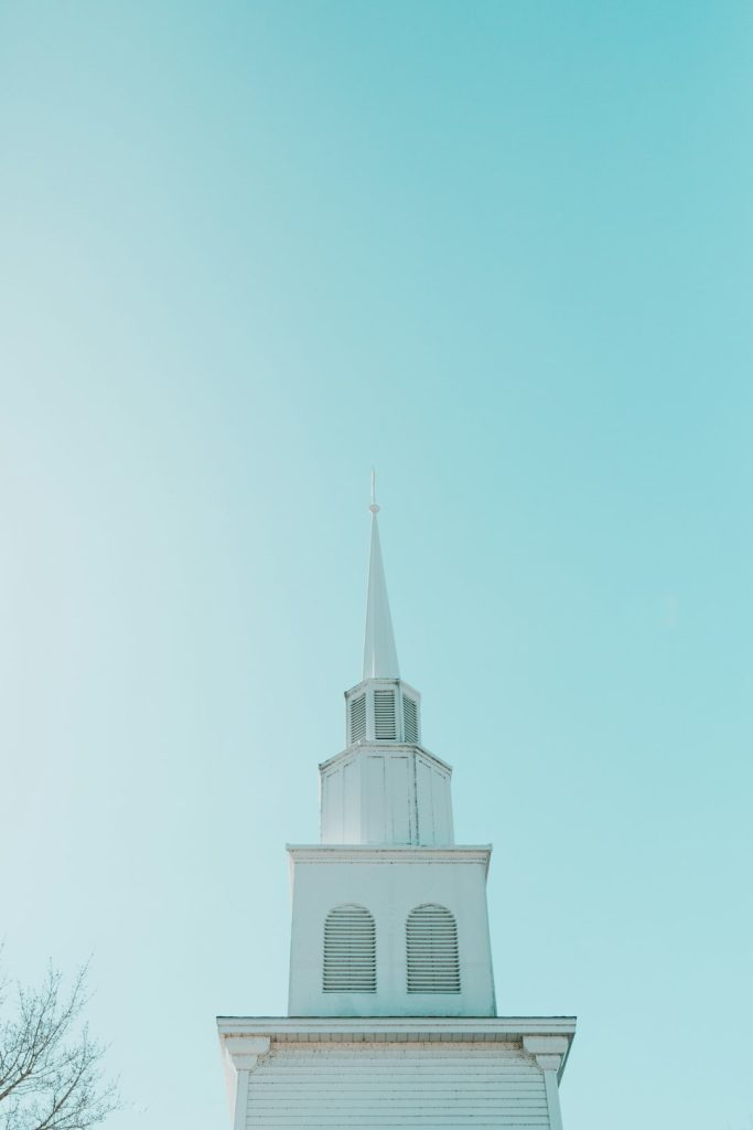white concrete building under blue sky during daytime church website, religious theme, wordpress design