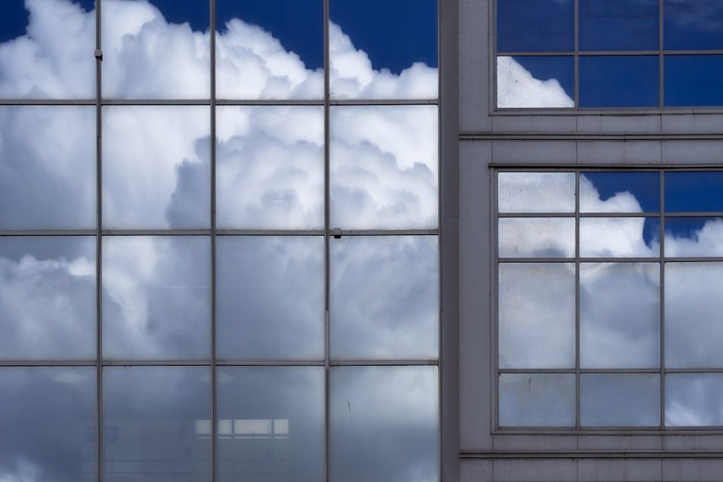 a building with windows cloud computing, erp dashboard, business analytics