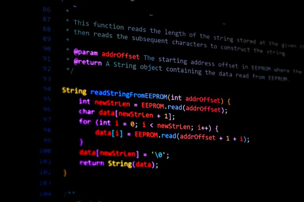 Code written on a screen, likely programming related. javascript code, regex, string replace