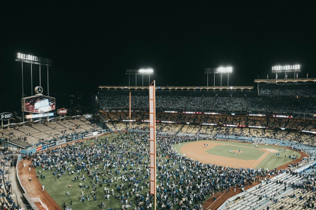 people inside ballpark dodgers marlins game night stadium crowd