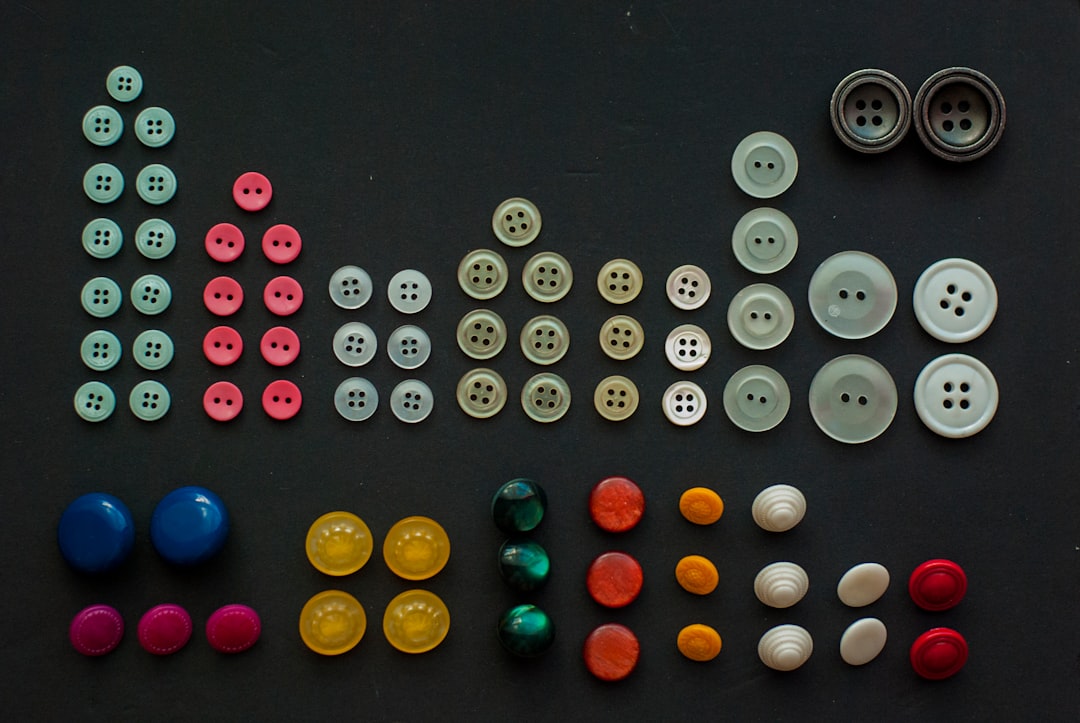 a collection of buttons and buttons on a table lottery balls machine, numbered balls, drawing in progress