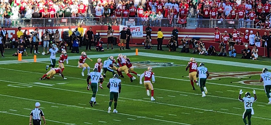 A football game is being played in a stadium 49ers super bowl 1989, joe montana five touchdowns, nfl championship celebration confetti