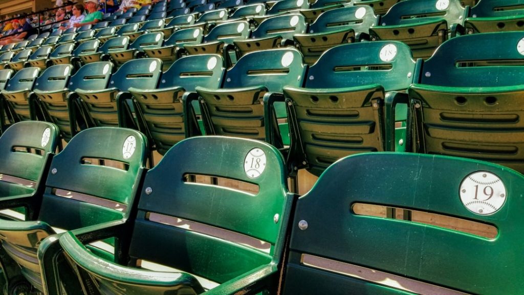 green and blue plastic chairs mobile ticket app screen, resale ticket listing, baseball event pricing
