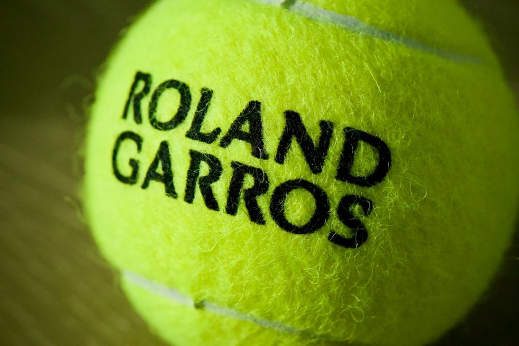 Close up of a roland garros tennis ball. roland garros stadium, clay court tennis, paris grand slam