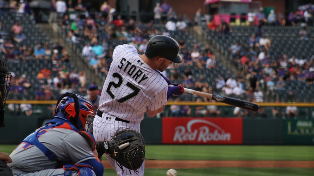 man in white and black baseball jersey holding baseball bat mlb batter swing action, home run celebration, dugout reaction
