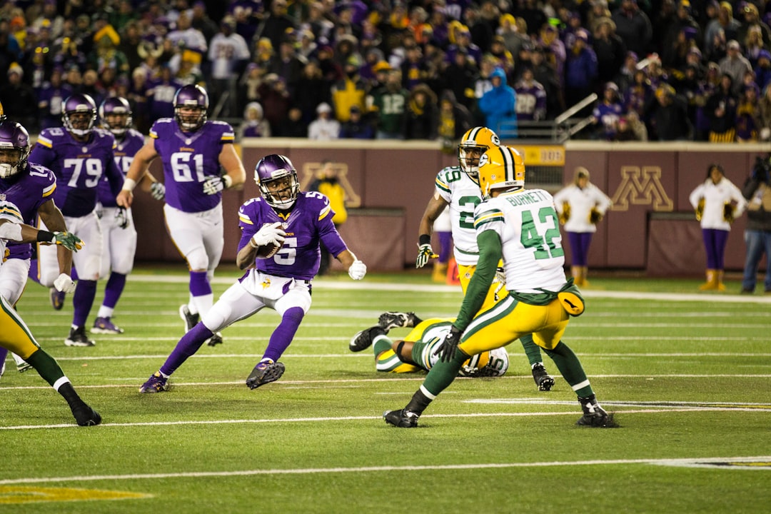 American football player nfl defense sack, quarterback pressure moment, stadium lights football