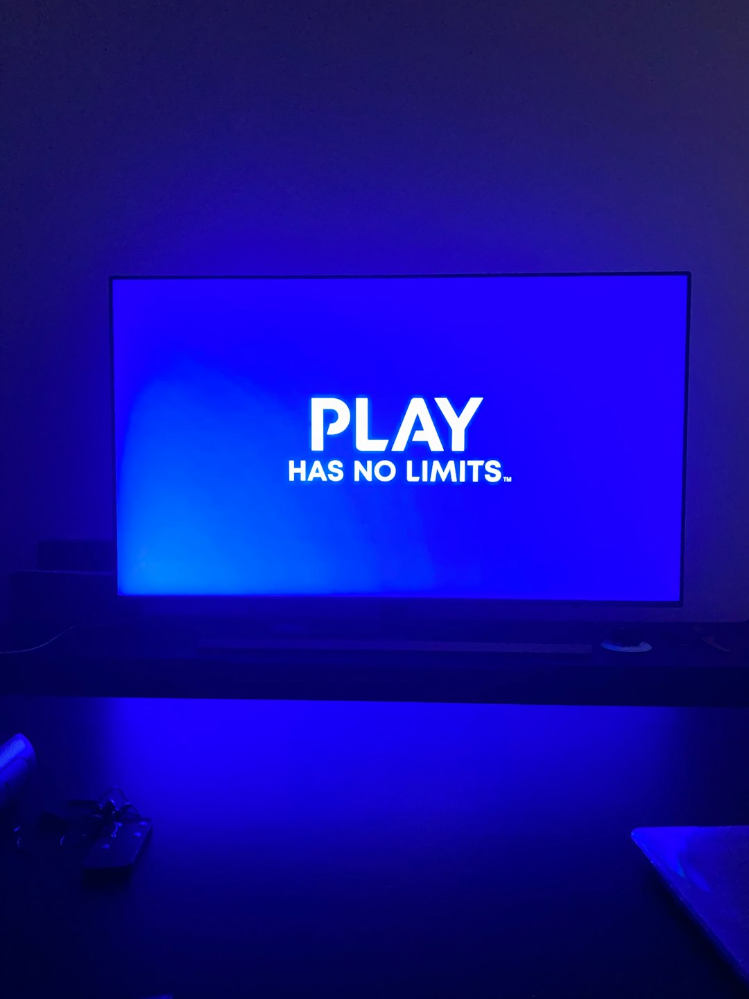 black flat screen tv turned on displaying no signal playstation console setup screen, user account creation, error notification