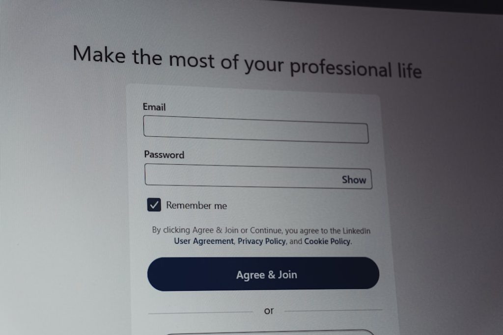 Linkedin login screen with email and password fields. team collaboration, password manager dashboard, secure login screen