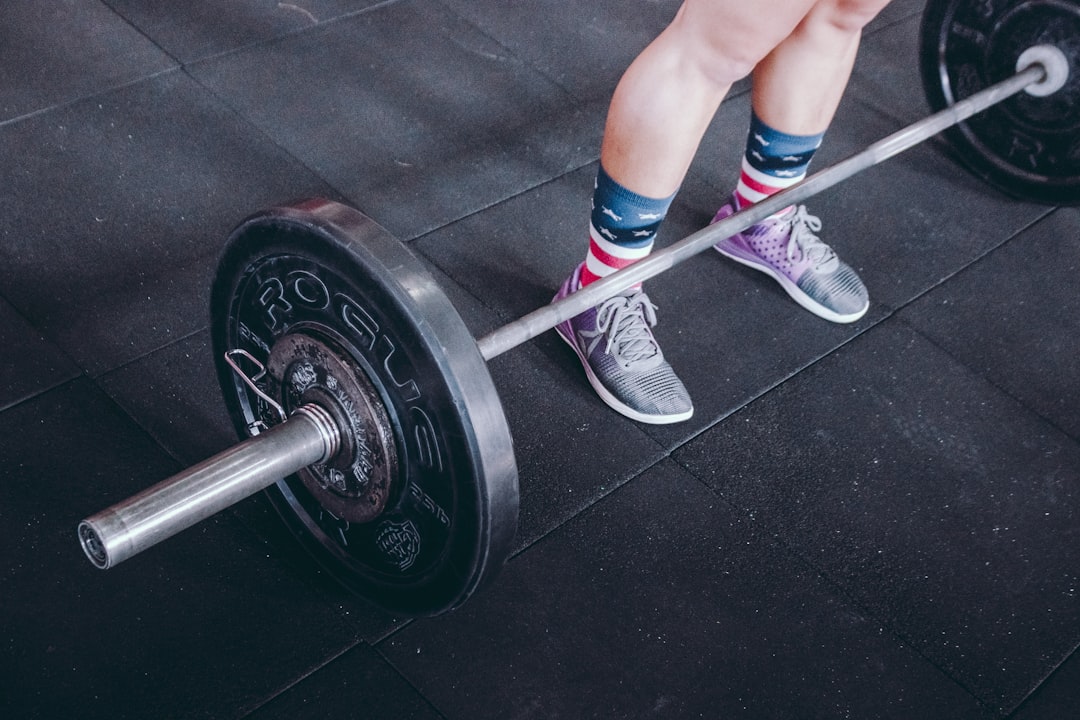 person doing exercise athlete bodyweight squat training indoor gym