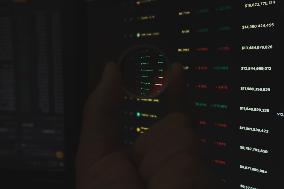 person holding black remote control dark web monitoring screen, cybersecurity analysis, data breach concept