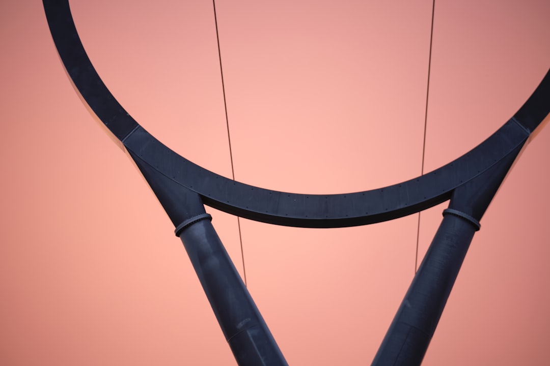 shape, arrow close up tennis racket strings, tennis ball on racket, detailed racket frame texture