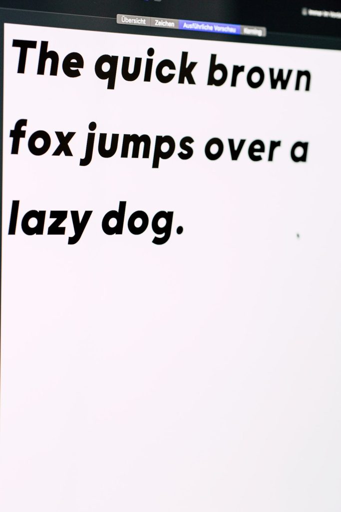 the quick brown fox jumps over a lazy dog text on white background markdown editor interface, minimal writing screen, live preview example